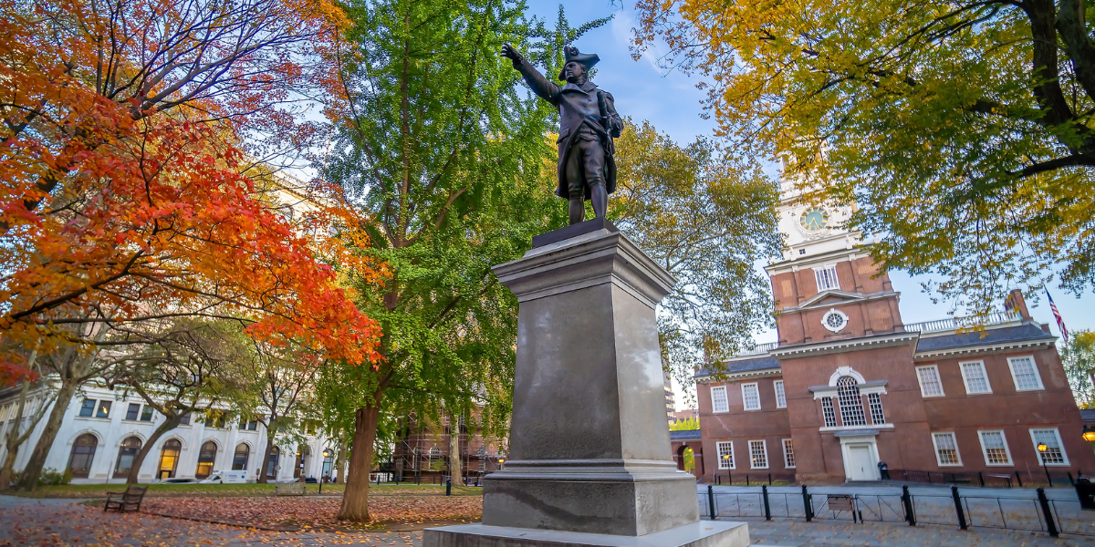 Philadelphia in the fall with with statue