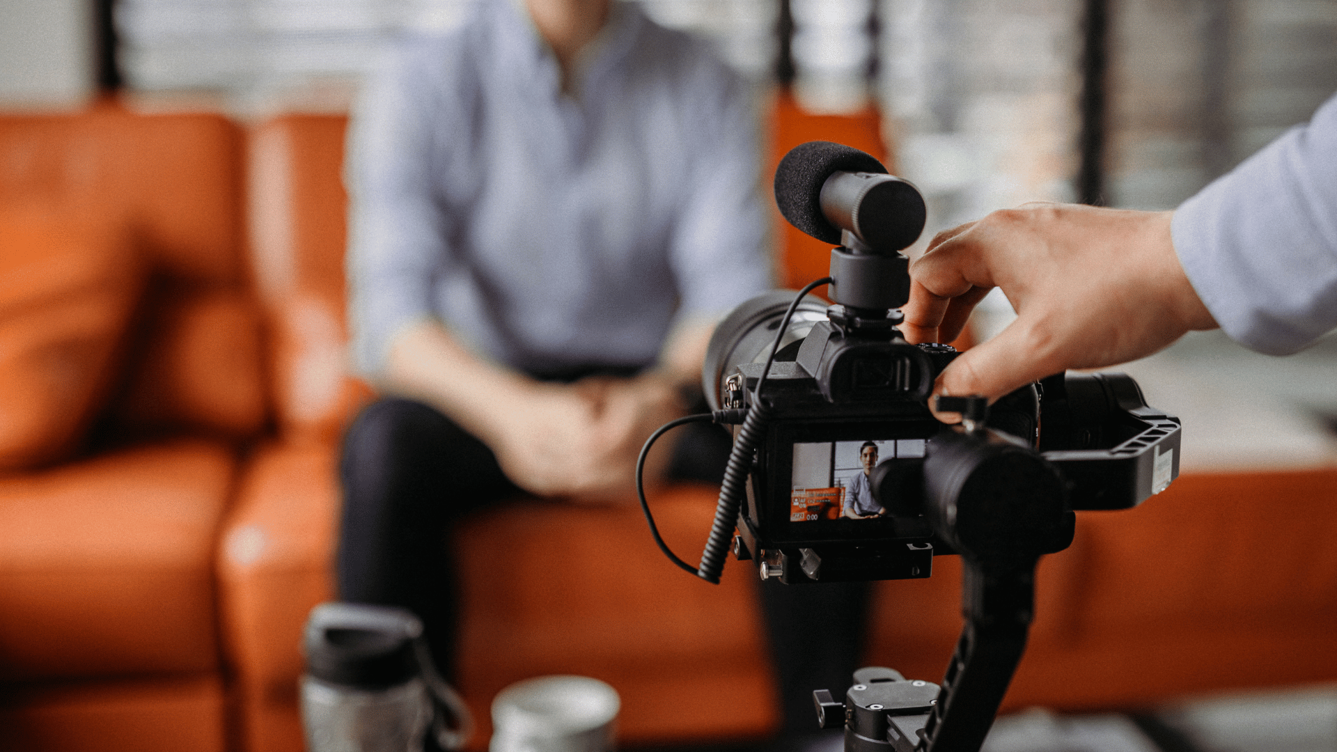 man being recorded on camera