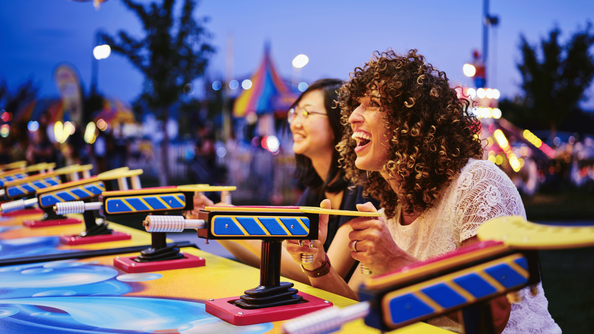 two women enjoying summer games