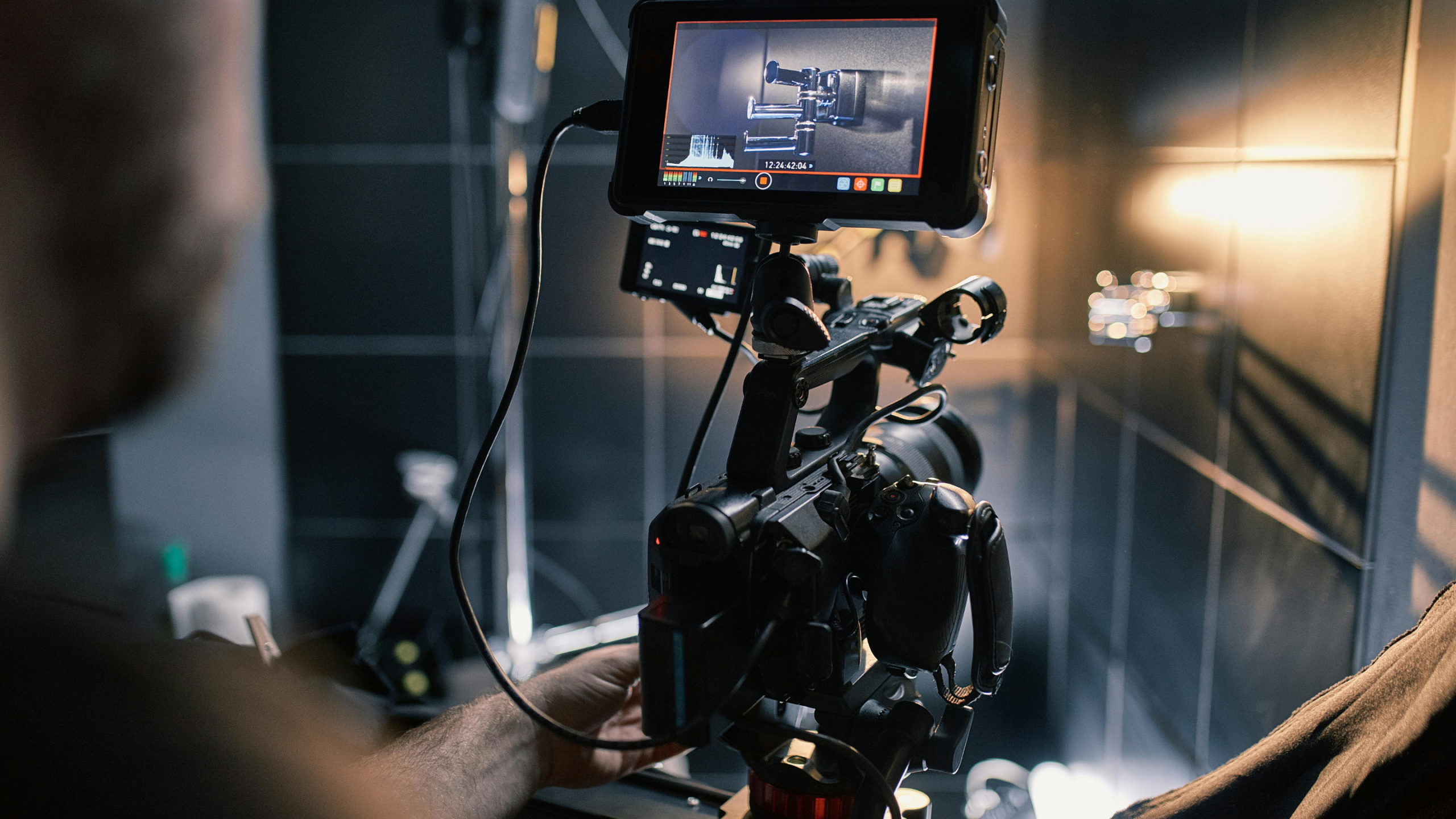 man recording video ad for bathroom remodel
